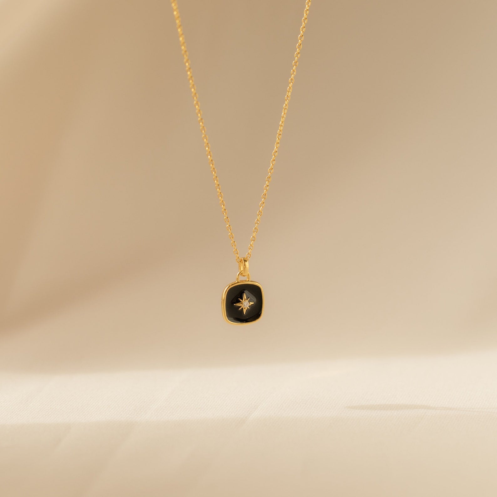 Find Your Inner Light: Hermoine North Star Necklace 18K Gold Midnight Black
